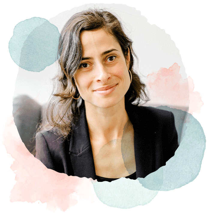 An image of Ruth smiling surrounded by watercolour shapes. Premarital counselling in vancouver bc